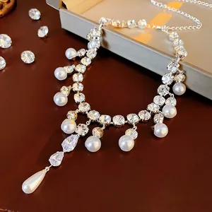 Elegant silver necklace with sparkling cubic zirconia, round and teardrop pearls on leather