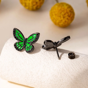 Boucles d'oreilles papillon vintage en émail noir et vert avec pierres précieuses