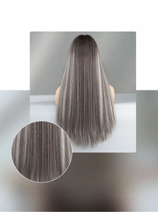 Detail of matte high temperature silk hair texture with brown gradient long straight finish