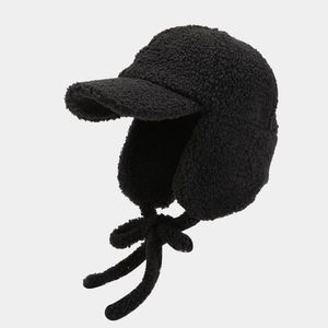 Thick black sherpa aviator hat with earflaps and adjustable chin strap for winter warmth