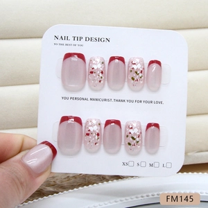 Unghie finte fatte a mano french rosse con glitter cat-eye e paillettes luccicanti