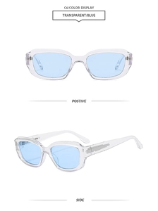 Detail view of square vintage sunglasses with transparent frames and light blue lenses
