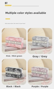 Four different colors of large capacity floral waterproof makeup bags with NICE ribbon detail