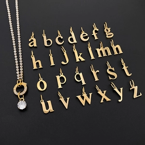 Detail view of 14K gold-plated alphabet pendants with sparkling zircon necklace chain