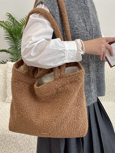 Brown fuzzy teddy tote bag with spacious interior for daily commute and autumn styling