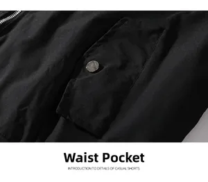 Detailed close-up of a waist flap pocket with silver metal button on black jacket