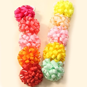 Detailed set of multi-colored grosgrain ribbon curly bow hair ties on display cards