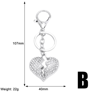 Macro view of crystal heart keychain with size dimensions 107mm x 40mm and silver finish