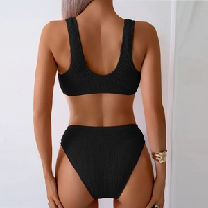 Chic black waffle texture two-piece bikini swimsuit featuring a backless vest top and high waist bottom