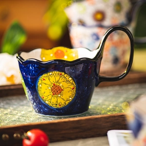 Hand-painted ceramic sunflower coffee mug with wavy rim and unique handle in blue finish