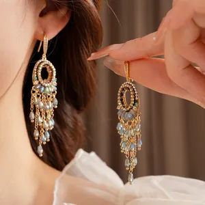 Elegant zircon oval crystal tassel drop earrings with luxurious gold plated finish