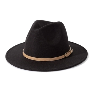 Detail of black wool fedora hat featuring a camel leather band and golden metal buckle