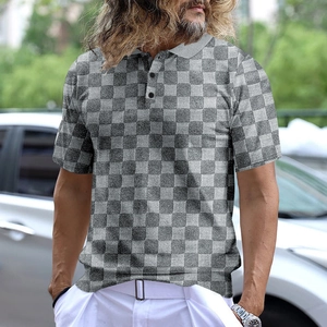 Close-up of grey jacquard plaid pattern and collar detail on men's short sleeve polo shirt