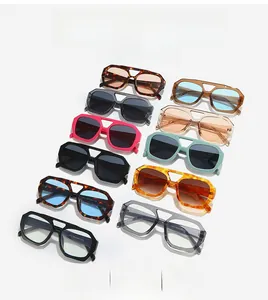 Collection de lunettes de soleil géométriques à double pont surdimensionnées en couleurs