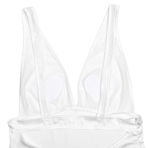Detail of white satin dress with deep V-neck, thin straps and heart-shaped pads