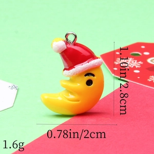 Detailed view of yellow moon resin charm with Santa hat including size and weight specs