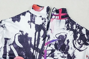 Detail of artistic print bodysuit featuring a high collar and hidden back zipper