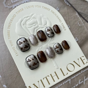 Short square press-on nails set featuring brown cat-eye, silver glitter, and leopard prints