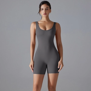 Detail of high-elastic grey yoga bodysuit featuring a V-shaped back and seamless athletic fit
