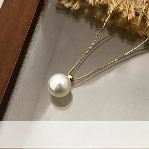 French vintage S925 silver pearl necklace with a single round pearl and gold chain