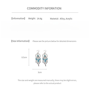Detaillierte Infografik zeigt Größe 8,5cm x 3cm und 14,4g Gewicht für Vogel-Ohrringe