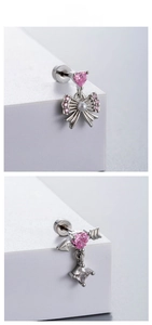Pink zircon bow and cupid heart studs in polished titanium steel with screw back details