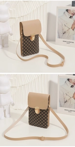 Detailed view of a vintage monogram small crossbody bag with gold lock and adjustable strap