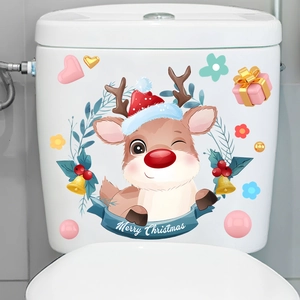 Close-up of a cute reindeer Christmas wreath sticker applied on a white toilet tank