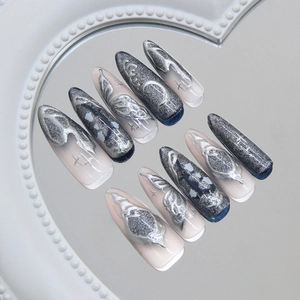 Silver cat-eye press on nails with cyberpunk butterfly and moon designs in long stiletto shape