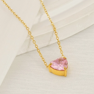Elegant gold stainless steel necklace featuring a sparkling pink heart zircon pendant