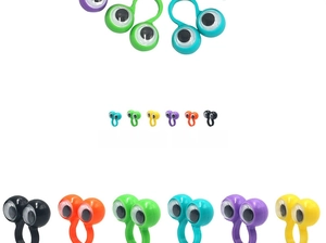 Detailed view of colorful plastic googly eye finger rings in six different bright shades