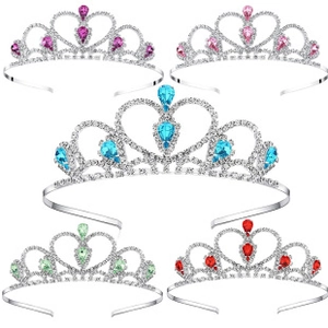 Close-up of alloy crowns with multi-color rhinestones in purple pink blue and red