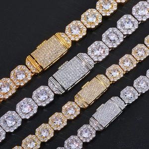 Luxurious gold and silver hip hop chains with cubic zirconia in a diagonal layout