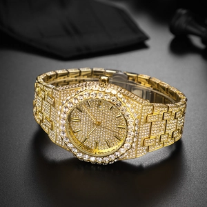 Luxury gold iced-out quartz watch with full crystal pavé dial and date window