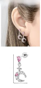 Detail view of crescent moon stud earrings with pink heart zircon and size dimensions