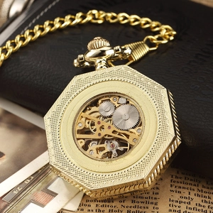 Macro view of octagonal gold skeleton pocket watch showing inner mechanical gears