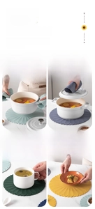 Detail of 30cm silicone placemats showing heat resistance and floral non-slip texture