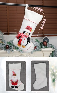 Detail view of large Christmas stocking with 3D penguin and Santa decor, size 46x20cm
