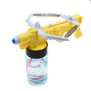 Detail view of crossbow bubble gun with transparent solution bottle and internal spring