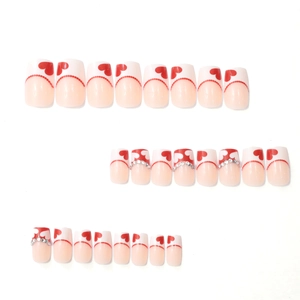 French tip press-on nails with red heart designs and silver rhinestones, 24 piece set