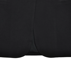 Close-up of black blazer bottom slit detail and high-quality fabric texture