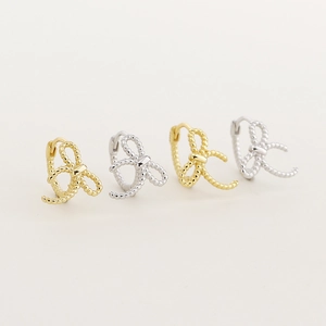 Elegant s925 silver bow-knot hoop earrings shown in gold and silver finishes