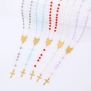 Detailed set of five colorful crystal rosary necklaces with golden crosses and oval medals