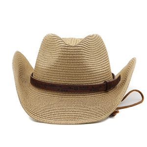 Detail of hand-woven straw cowboy hat with embossed floral leather band and adjustable chin cord