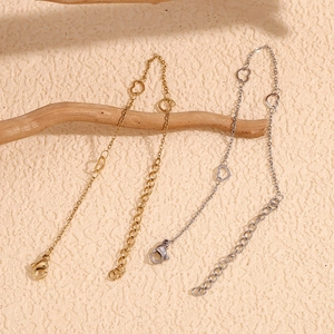Detail of 14K gold plated stainless steel heart link bracelet with lobster clasp