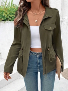 Detail of army green drawstring waist jacket with metal zipper and utility pockets