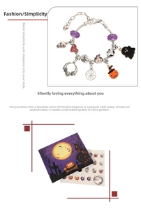 Detail of Halloween DIY bracelet kit featuring skull and pumpkin charms with gift box