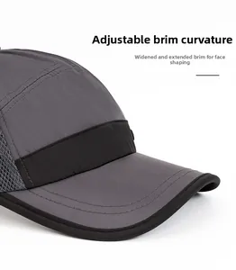 Detail of breathable mesh and foldable brim on a dark gray quick-dry sport baseball cap