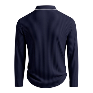 Detail of navy blue ribbed knit texture and white striped collar on men's long sleeve polo