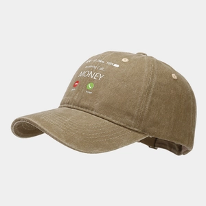 Close-up of brown washed cotton baseball cap with creative money call graphic print